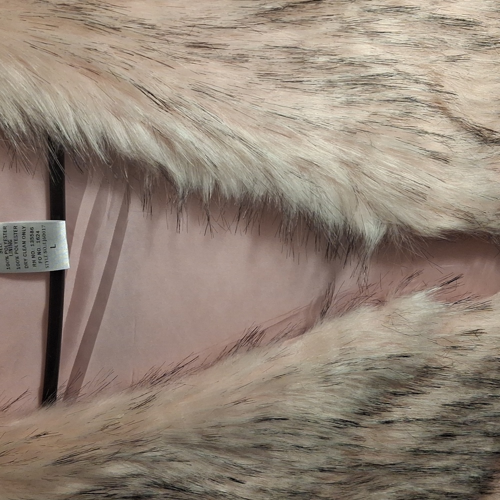 Main Strip fur vest light pink mixed with black fur.